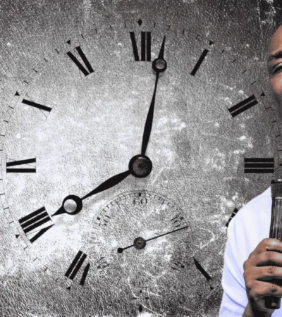 image of apostle joshua selman with a clock indicative of change in times and seasons